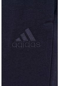 Adidas - adidas spodnie GK8979 męskie kolor granatowy z nadrukiem. Kolor: niebieski. Materiał: bawełna, materiał, dzianina. Wzór: nadruk #4