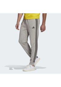 Adidas - Spodnie Essentials French Terry Tapered Cuff 3-Stripes Rozmiar XXL Szary - GK88…. Kolor: szary, wielokolorowy, czarny. Wzór: paski