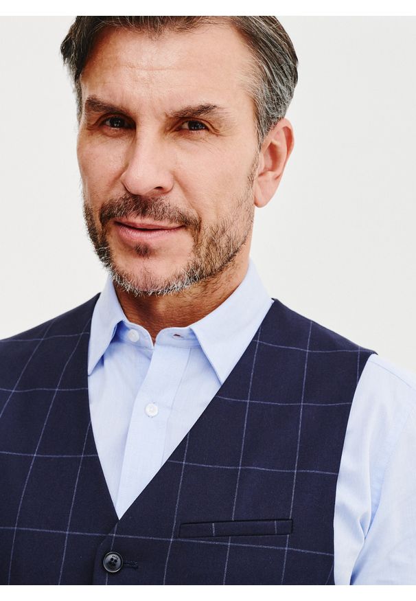 Pako Lorente - PAKO LORENTE – Granatowa kamizelka męska w kratę. Kolor: niebieski. Materiał: poliester, elastan, wiskoza. Wzór: kratka. Styl: elegancki, młodzieżowy