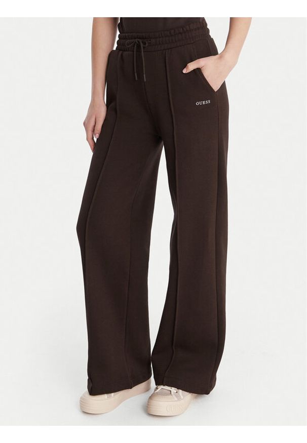 Guess Spodnie dresowe V6RB17 K9V31 Brązowy Regular Fit. Kolor: brązowy. Materiał: bawełna
