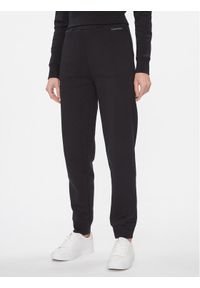 Calvin Klein Spodnie dresowe Metallic Micro Logo Jogger K20K206965 Czarny Regular Fit. Kolor: czarny. Materiał: bawełna, syntetyk