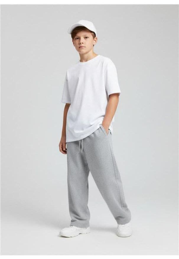 Sinsay - Spodnie dresowe straight - szary. Kolor: szary. Materiał: dresówka