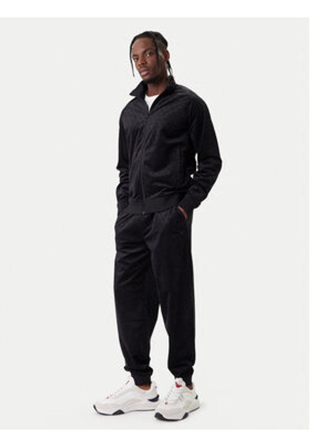 Guess Spodnie dresowe Z6RB14 KD612 Czarny Regular Fit. Kolor: czarny. Materiał: syntetyk