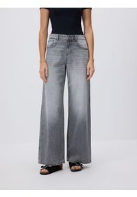 Reserved - Jeansy baggy fit - jasnoszary. Kolor: szary