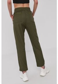 Champion Spodnie 113801 damskie kolor zielony. Kolor: zielony. Materiał: tkanina. Wzór: gładki #2
