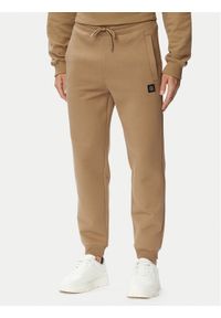 Hugo - HUGO Spodnie dresowe Dimacs 50533695 Beżowy Relaxed Fit. Kolor: beżowy. Materiał: bawełna #1