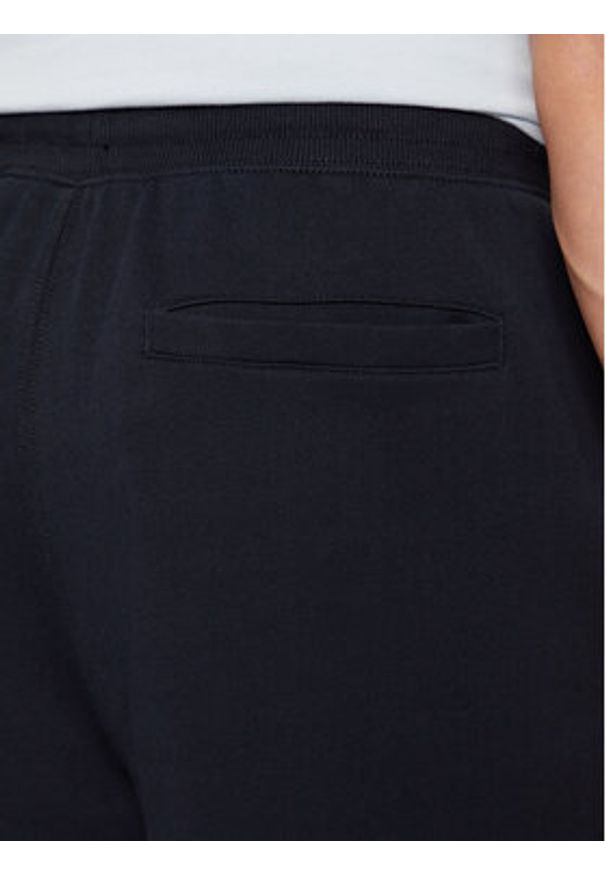 TOMMY HILFIGER - Tommy Hilfiger Spodnie dresowe Terry MW0MW37236 Granatowy Regular Fit. Kolor: niebieski. Materiał: bawełna