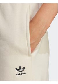 Adidas - adidas Spodnie dresowe Essentials Fleece IA6436 Écru Regular Fit. Materiał: bawełna