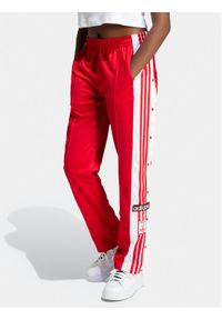 Adidas - adidas Spodnie dresowe Adibreak IP0620 Czerwony Regular Fit. Kolor: czerwony. Materiał: syntetyk #1