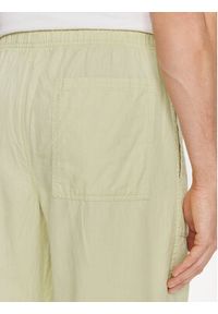 Calvin Klein Jeans Spodnie materiałowe J30J325126 Zielony Regular Fit. Kolor: zielony. Materiał: len #5