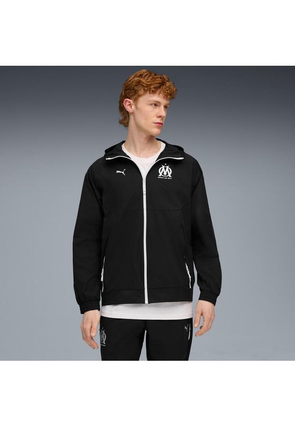 Puma - Zestaw dresowy OM Woven 2025/26. Kolor: czarny. Materiał: dresówka. Sport: piłka nożna