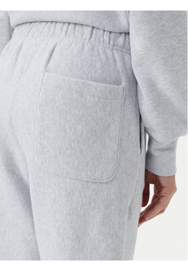 Champion Spodnie dresowe 117872 Szary Slim Fit. Kolor: szary. Materiał: bawełna