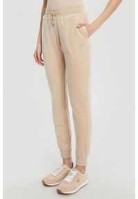 Guess - GUESS Beżowe damskie spodnie dresowe Couture, Rozmiar S. Kolor: beżowy. Materiał: dresówka #1
