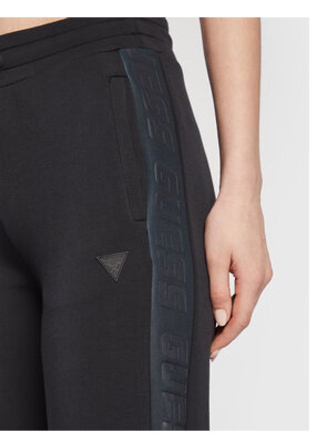 Guess Spodnie dresowe V3RB21 K7UW2 Granatowy Regular Fit. Kolor: niebieski. Materiał: wiskoza