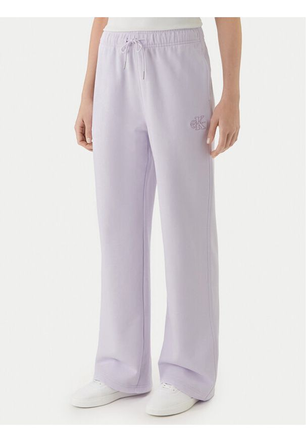 Calvin Klein Jeans Spodnie dresowe Embossed Monologo LV047F206G Różowy Regular Fit. Kolor: różowy. Materiał: bawełna