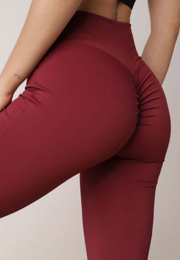 Born2be - Bordowe Legginsy Typu Dzwony z Wysokim Stanem Orralise. Okazja: na co dzień. Stan: podwyższony. Kolor: czerwony. Styl: casual