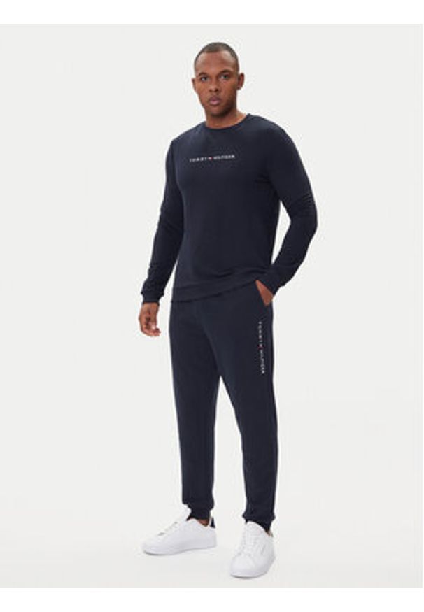 TOMMY HILFIGER - Tommy Hilfiger Spodnie dresowe UM0UM03664 Granatowy Regular Fit. Kolor: niebieski. Materiał: bawełna