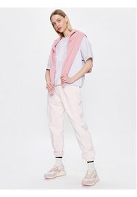 New Balance Spodnie dresowe Athletics Nature WP23553 Różowy Relaxed Fit. Kolor: różowy. Materiał: bawełna, dresówka