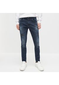 Reserved - Spodnie jeansowe skinny - Granatowy. Kolor: niebieski. Materiał: jeans #1