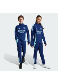 Adidas - Spodnie Arsenal Tiro 24 Training. Kolor: niebieski. Materiał: dresówka, materiał. Sport: piłka nożna