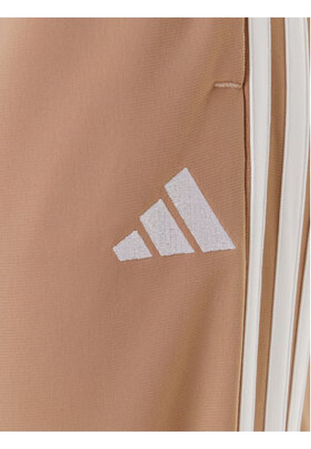 Adidas - adidas Dres Essentials 3-Stripes JX0507 Beżowy Regular Fit. Kolor: beżowy. Materiał: syntetyk