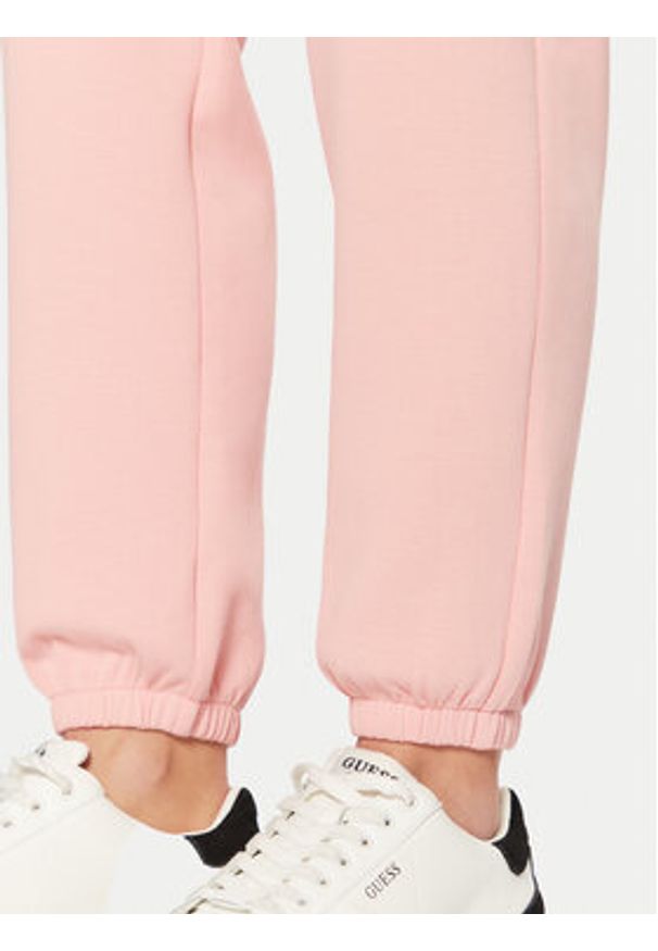 Guess Spodnie dresowe V5RB02 KCLD1 Różowy Regular Fit. Kolor: różowy. Materiał: bawełna, syntetyk