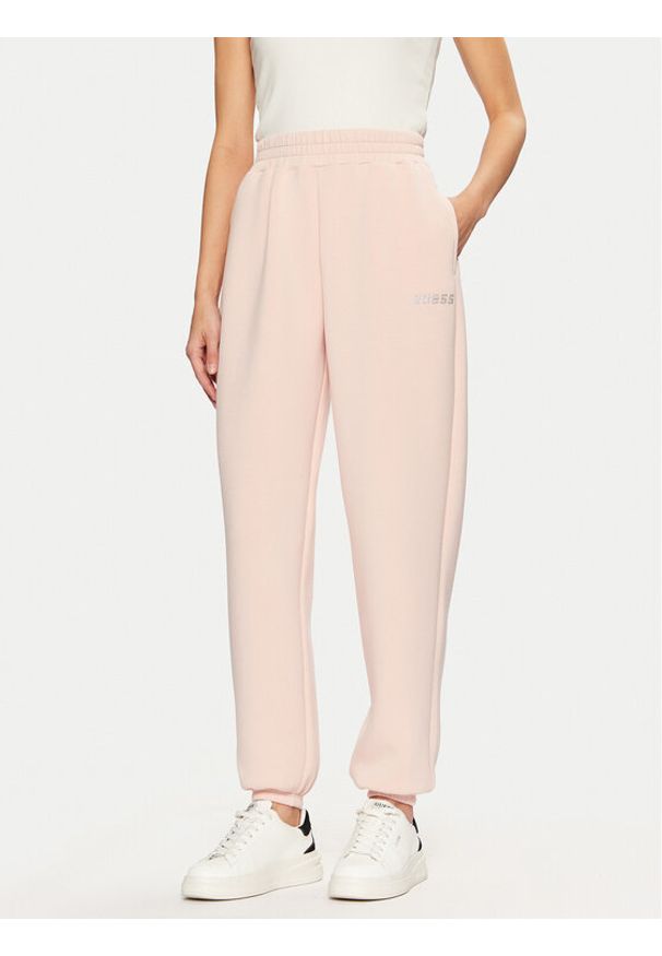 Guess Spodnie dresowe V4BB13 K7UW2 Różowy Regular Fit. Kolor: różowy. Materiał: wiskoza