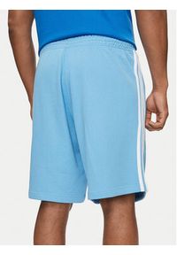 Adidas - adidas Szorty sportowe adicolor 3-Stripes IR8008 Niebieski Regular Fit. Kolor: niebieski. Materiał: bawełna. Styl: sportowy