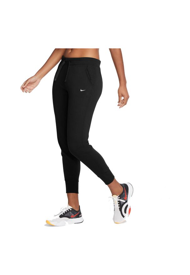 Spodnie damskie treningowe Nike Dri-FIT CU5495. Materiał: materiał, włókno, dzianina, skóra, bawełna, poliester. Technologia: Dri-Fit (Nike). Sport: fitness
