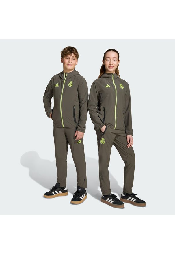 Adidas - Spodnie Real Madrid Tiro 25 Competition Vis Tech Travel Kids. Kolor: szary, wielokolorowy, żółty. Sport: piłka nożna