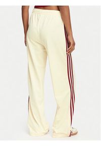 Adidas - adidas Spodnie dresowe Firebird Loose Tracksuit KS4671 Kremowy Loose Fit. Kolor: kremowy. Materiał: syntetyk #2