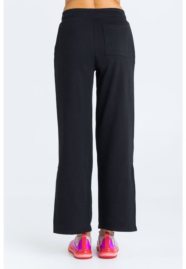 Armani Exchange - Spodnie dresowe ARMANI EXCHANGE. Materiał: dresówka. Wzór: nadruk