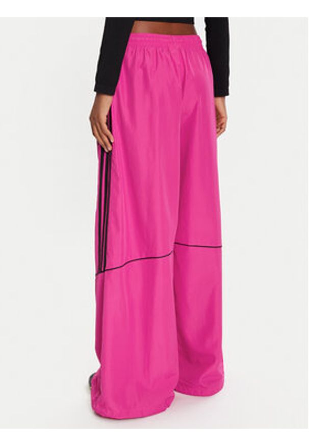 Adidas - adidas Spodnie dresowe Teamgeist adicolor JV7481 Różowy Oversize. Kolor: różowy. Materiał: syntetyk
