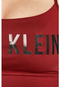 Calvin Klein Performance - Biustonosz sportowy. Kolor: brązowy. Materiał: poliester, materiał, elastan. Rodzaj stanika: odpinane ramiączka. Wzór: nadruk #3