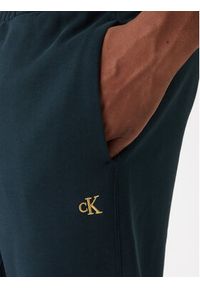 Calvin Klein Jeans Spodnie dresowe LV04RD241G Granatowy Regular Fit. Kolor: niebieski. Materiał: bawełna #3