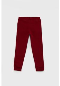 Champion Spodnie dziecięce kolor bordowy gładkie. Kolor: czerwony. Wzór: gładki