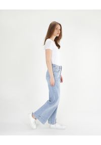 Unisono - Elastyczne jasne jeansy. Materiał: jeans. Długość: długie. Styl: klasyczny