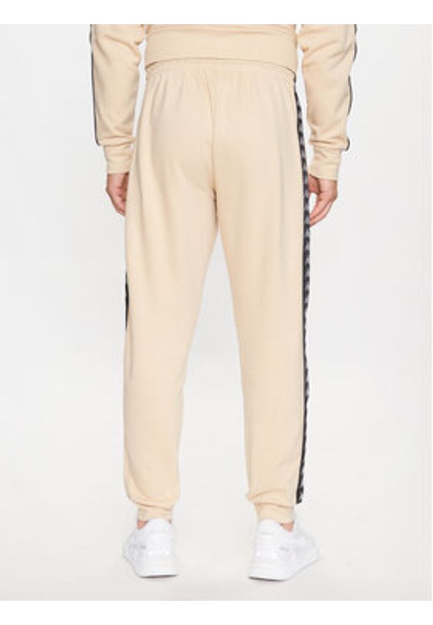 Kappa Spodnie dresowe 313014 Beżowy Regular Fit. Kolor: beżowy. Materiał: bawełna