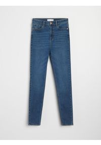 Sinsay - Spodnie jeansowe slim fit - granatowy. Kolor: niebieski