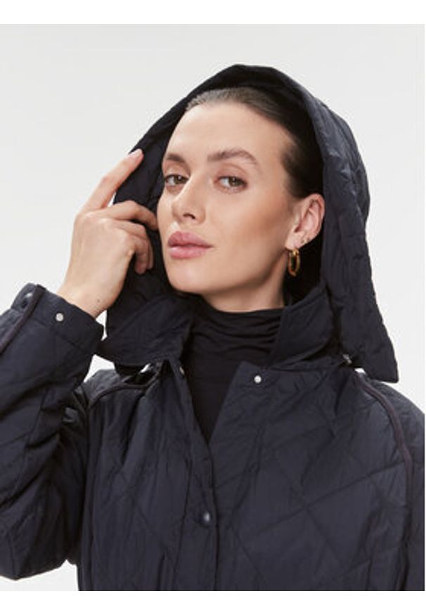 TOMMY HILFIGER - Tommy Hilfiger Kurtka przejściowa WW0WW40469 Granatowy Relaxed Fit. Kolor: niebieski. Materiał: syntetyk