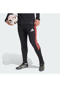 Adidas - Spodnie treningowe Tiro26 League Regular. Kolor: czerwony, wielokolorowy, czarny. Materiał: dresówka. Technologia: ClimaCool (Adidas). Sport: piłka nożna #1