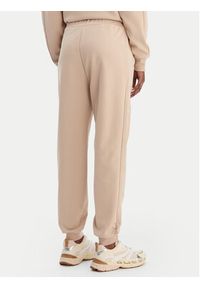 Guess Spodnie dresowe V5BB23 KCX22 Beżowy Regular Fit. Kolor: beżowy. Materiał: syntetyk #2