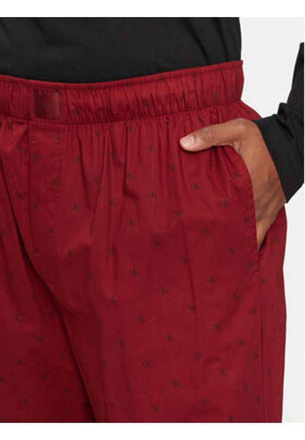 Calvin Klein Underwear Spodnie piżamowe 000NM2781E Czerwony Relaxed Fit. Kolor: czerwony. Materiał: bawełna