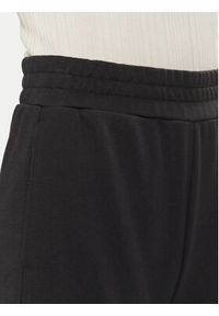 Converse Spodnie dresowe Retro Banana 10027565-A01 Czarny Loose Fit. Kolor: czarny. Materiał: bawełna #5
