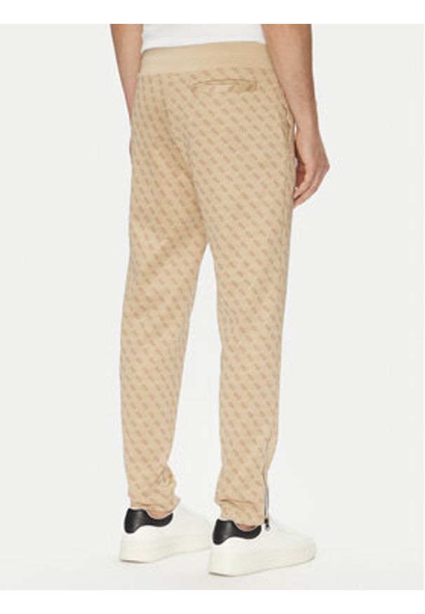Guess Spodnie dresowe Korbin Z2BB05 FL04Q Beżowy Regular Fit. Kolor: beżowy. Materiał: syntetyk, bawełna