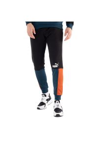 Spodnie Puma Ess+ Block Sweatpants Fl 84903771 - multikolor. Kolor: wielokolorowy. Materiał: materiał, dresówka, poliester, bawełna #1