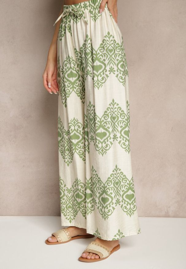 Renee - Zielone Spodnie z Wiskozy o Szerokim Kroju High Waist ze Wzorem Boho Neolissea. Okazja: na co dzień, na spacer. Stan: podwyższony. Kolor: zielony. Materiał: wiskoza. Sezon: lato. Styl: boho