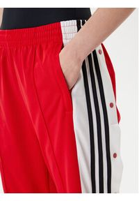 Adidas - adidas Spodnie dresowe Adibreak JY1354 Czerwony Loose Fit. Kolor: czerwony. Materiał: syntetyk #4