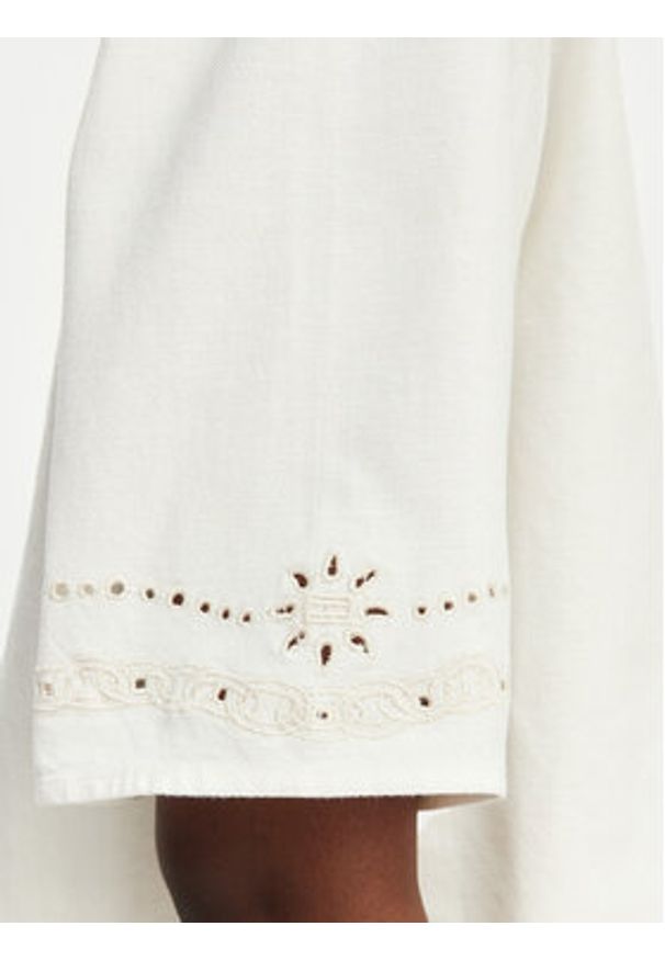 Tommy Jeans Koszula DW0DW22214 Kremowy Relaxed Fit. Kolor: kremowy. Materiał: bawełna