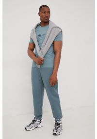 The North Face spodnie dresowe bawełniane męskie gładkie. Kolor: niebieski. Materiał: bawełna, dresówka. Wzór: gładki #3